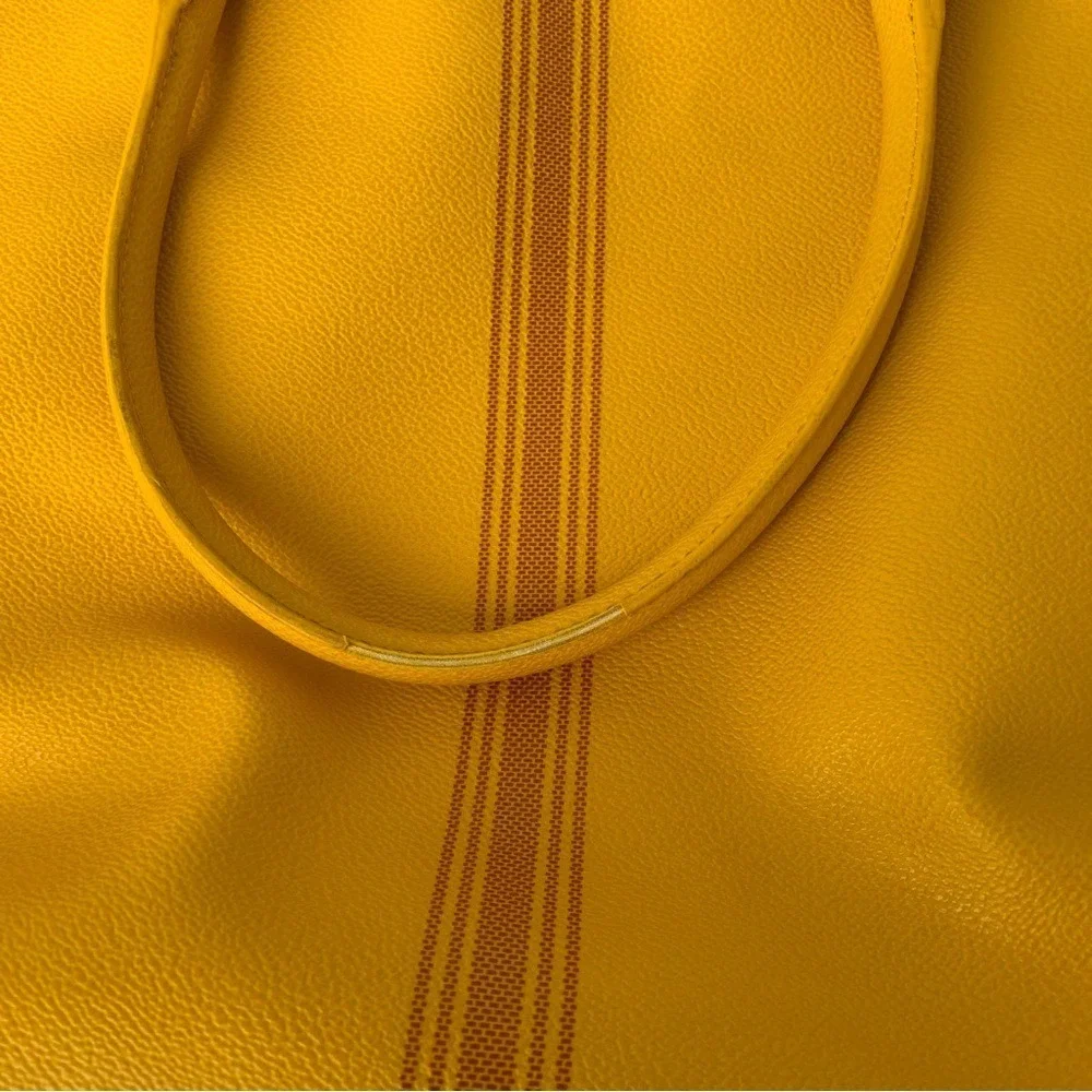 TORY BURCH. Yellow Leather Pebbled Roslyn‎ bag w/ stripes & a Logo accent.